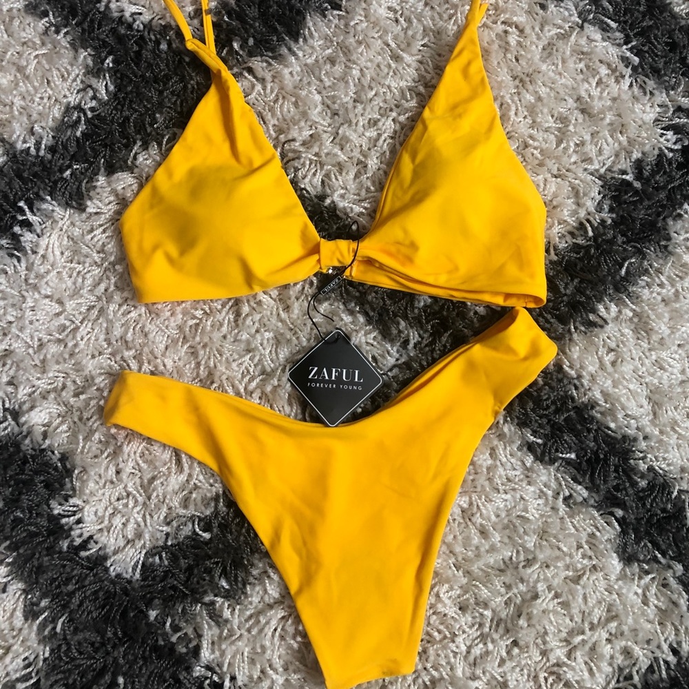 New yellow two piece bikin size medium